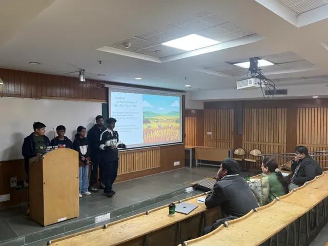 Student team presenting an idea to reviewers during Young Changemakers Bootcamp Season 6